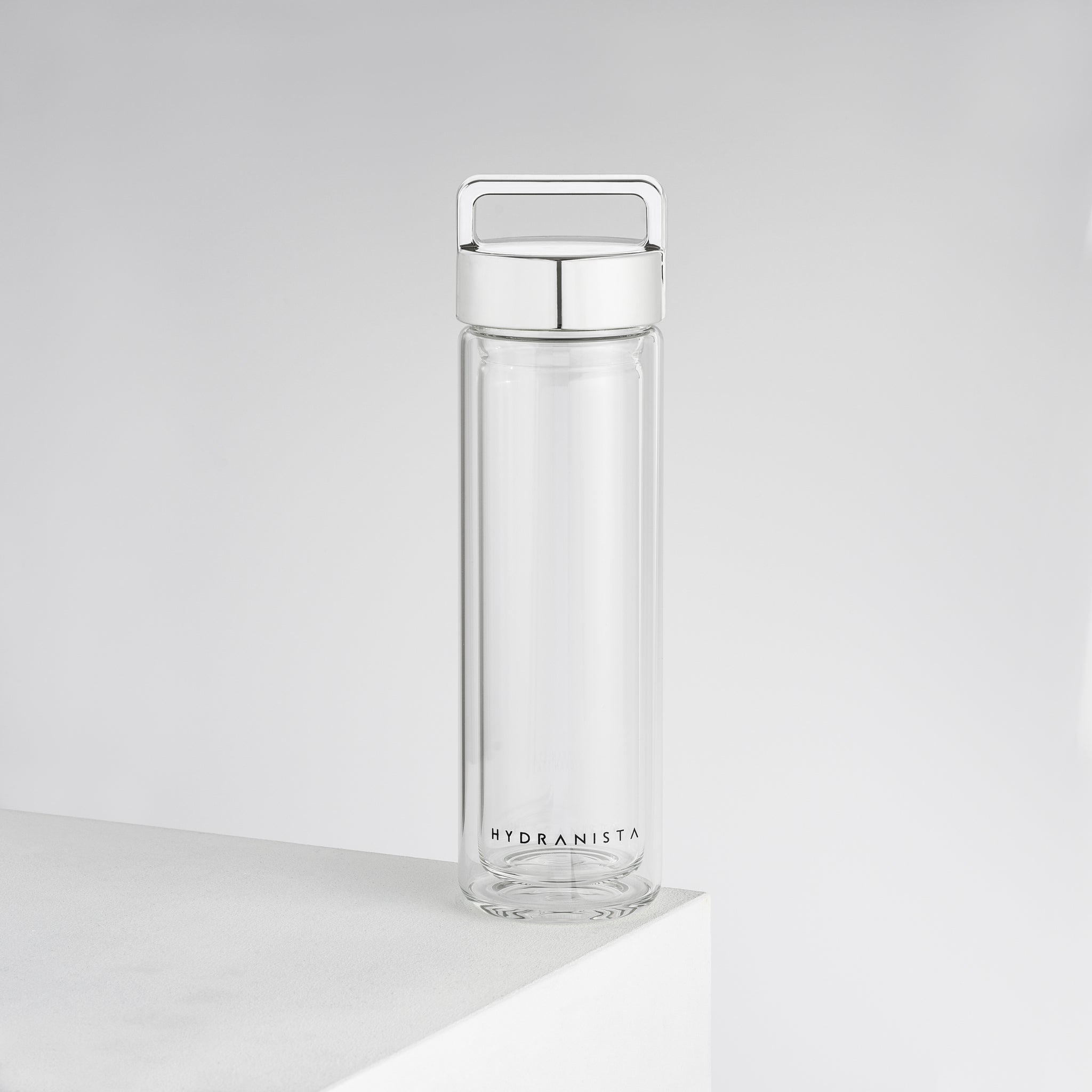 Water bottle glass silver lid Hydranista borosilicate stylish elegant tea strainer infused water sleev